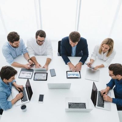 Professional team analyzing content strategy on digital devices